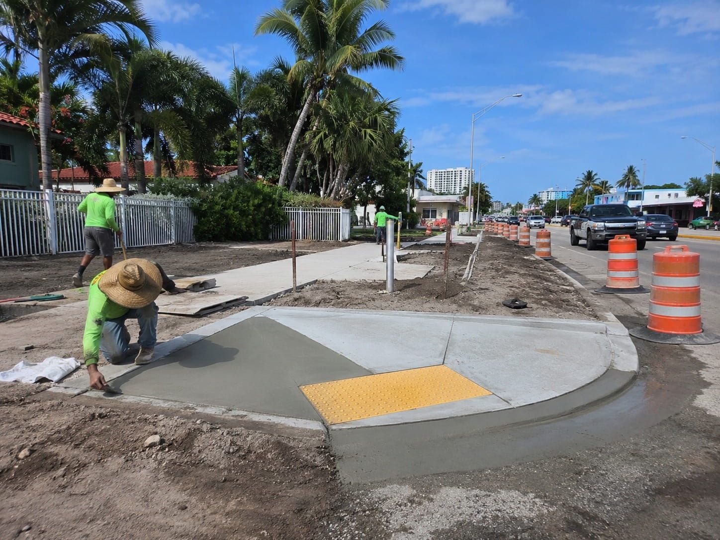 crew building an ADA curb ramp along a Miami street