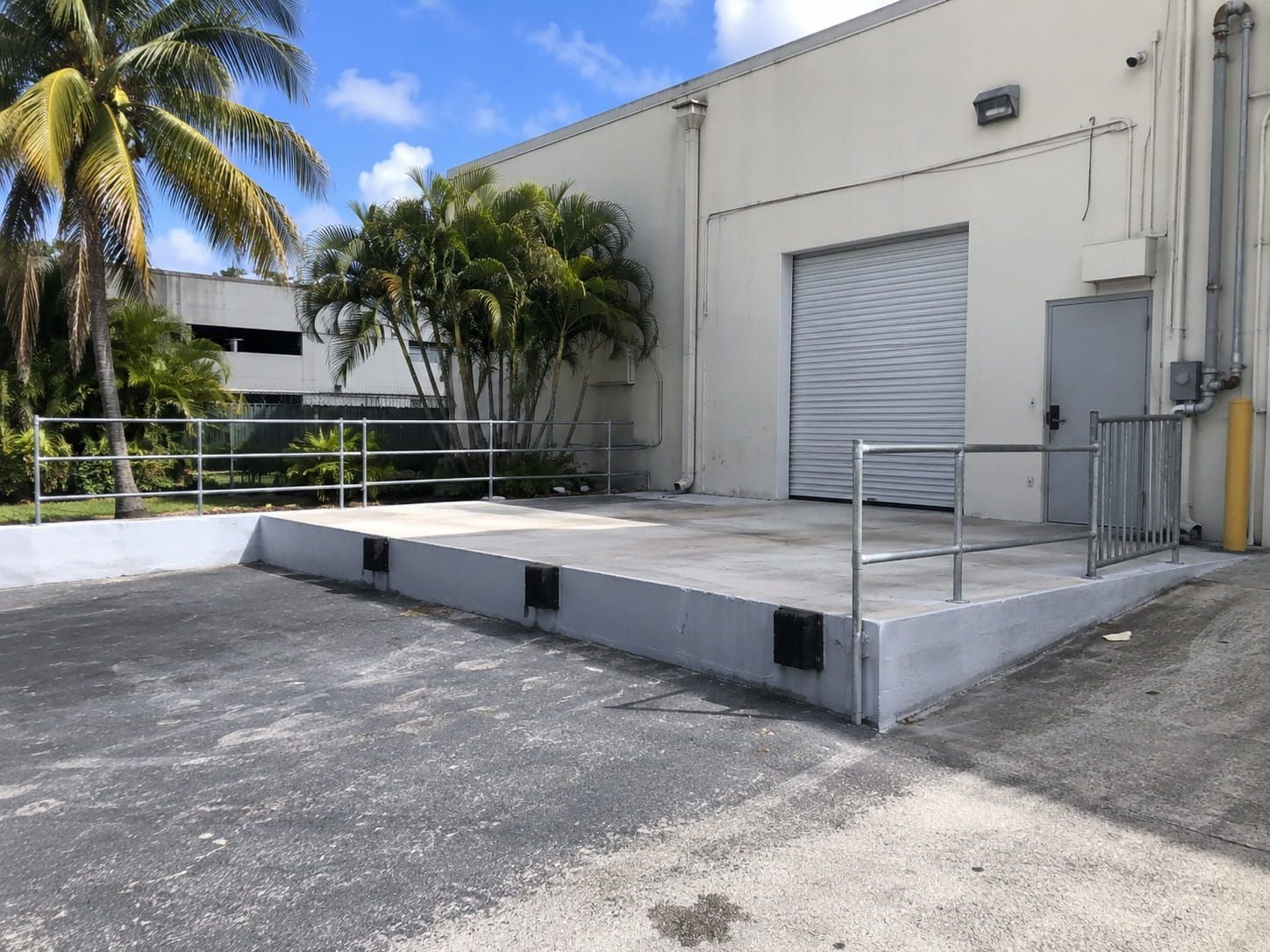 raised concrete loading dock platform at a Miami warehouse