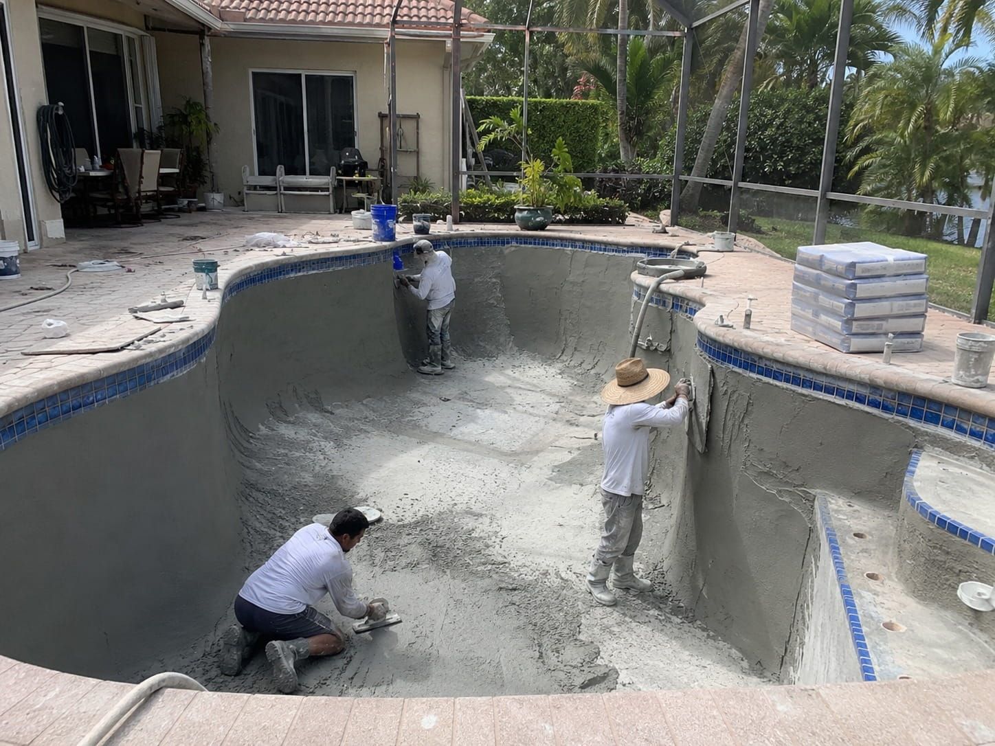 Miami pool resurfacing contractors on site